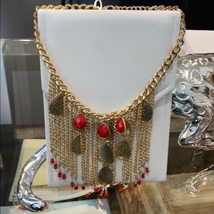 Thalia Sodi gold and red necklace,